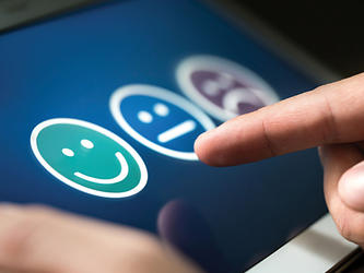 colour photograph on a people using an emotional feedback machine